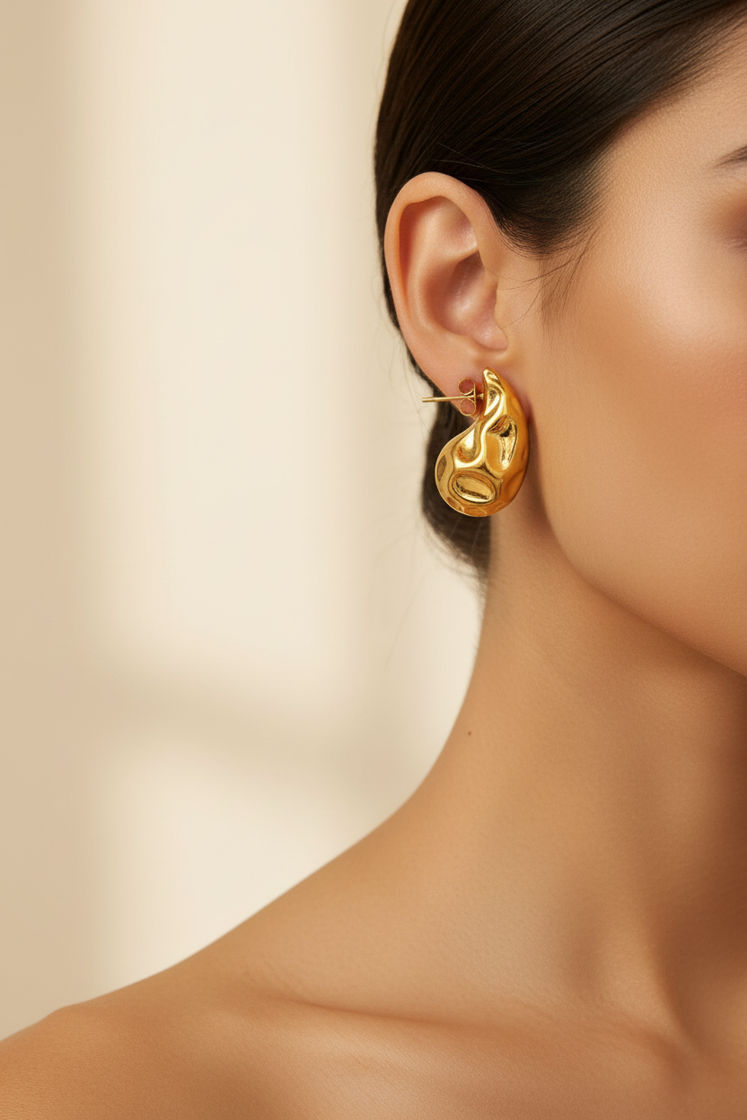 Gold Molten Teardrop Earrings on Model